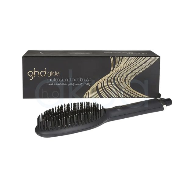Cepillo ghd Glide Control Now el color predominante en la imagen es negro y algunos detalles, como el anillo cerca de la base del mango, son metálicos en tono plateado H2o Akua