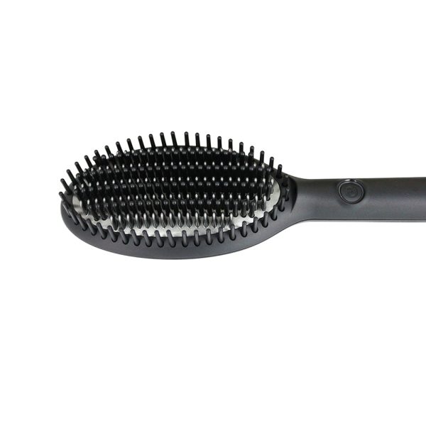 Cepillo ghd Glide Control Now el color predominante en la imagen es negro y algunos detalles, como el anillo cerca de la base del mango, son metálicos en tono plateado H2o Akua