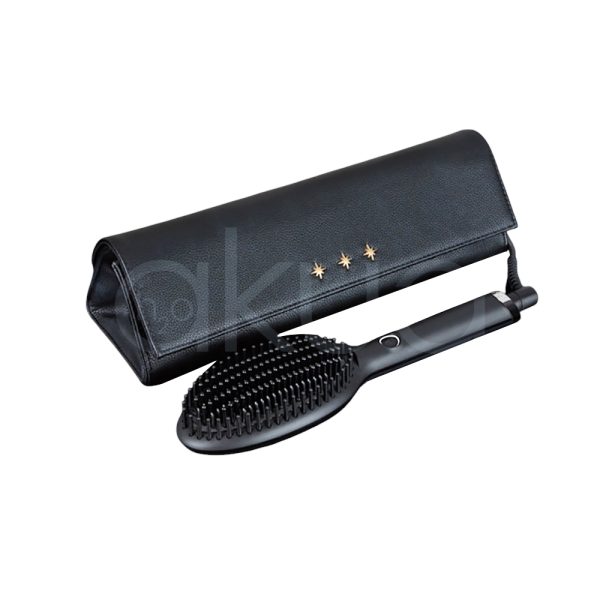 Cepillo ghd Glide Gift Set el color predominante en la imagen es negro y algunos detalles, como el anillo cerca de la base del mango, son metálicos en tono plateado H2o Akua