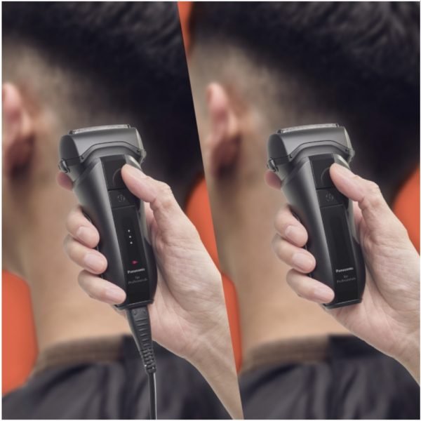 Afeitadora Panasonic ER-SP20 el color predominante es el negro mate con algunos detalles en negro brillante en la parte central del dispositivo. También se observan pequeños indicadores luminosos en blanco y un icono en rojo H2o Akua