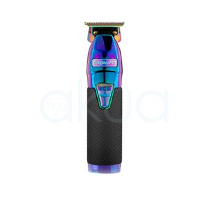 Maquina Chameleon Bosst+ Babyliss Pro El color predominante de la imagen es un degradado iridiscente que combina tonos metálicos de azul, violeta, rosa y amarillo, creando un efecto tornasolado y llamativo en la carcasa superior del dispositivo. La parte inferior del mango es de negro mate con textura antideslizante, lo que aporta contraste y un aspecto profesional. La zona de las cuchillas y tornillos presenta detalles en dorado metálico, resaltando sobre el resto del diseño H2o Akua