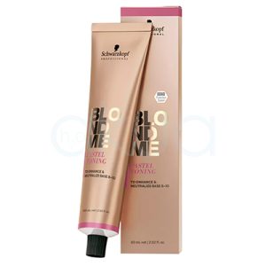 Tinte Blondme Pastel Toning Schwarzkopf el color predominante en la imagen es dorado metálico o champán, presente tanto en el tubo como en la caja del producto. Los detalles y textos están impresos en negro y morado, destacando la inscripción en morado. La base del tubo y la parte superior de la caja presentan una franja morada H2o Akua