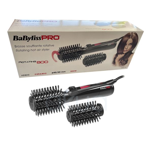 Cepillo Rotativo Moldeador Babyliss pro El color predominante de la imagen es negro mate, presente tanto en el cuerpo principal del dispositivo como en los cabezales intercambiables. Los detalles, como los botones y el logotipo "BaByliss PRO", están en blanco y rojo, lo que aporta contraste y resalta sobre el fondo oscuro H2o Akua