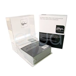 Aluminio Thuya para uñas 400 unid El color predominante es el blanco, presente tanto en el dispensador acrílico transparente como en la caja del producto. La caja tiene una franja negra en la parte inferior y el logotipo, así como el texto principal, están impresos en negro. El dispensador es completamente transparente, lo que permite ver el contenido interior y el paquete de hojas de aluminio en el interior del dispensador muestra un tono gris metálico, característico del aluminio H2o Akua