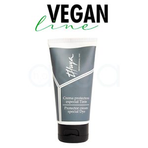 Crema Thuya protectora especial tinte 50ml El envase de forma cilíndrica con base plana, combina tonos gris oscuro y blanco. La mayor parte del tubo es gris oscuro, con detalles y líneas en blanco que enmarcan la información del producto. El tapón es negro y la tipografía del texto es blanca H2o Akua