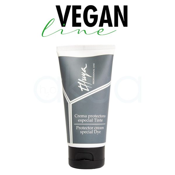 Crema Thuya protectora especial tinte 50ml El envase de forma cilíndrica con base plana, combina tonos gris oscuro y blanco. La mayor parte del tubo es gris oscuro, con detalles y líneas en blanco que enmarcan la información del producto. El tapón es negro y la tipografía del texto es blanca H2o Akua