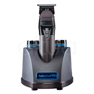 Maquina Snap trimmer Babyliss Pro El color predominante es gris metálico oscuro, presente en la base y el cuerpo principal del dispositivo. El recortador tiene detalles en negro brillante en la parte superior y en el cabezal de corte, así como una zona central con textura de gris plateado H2o Akua