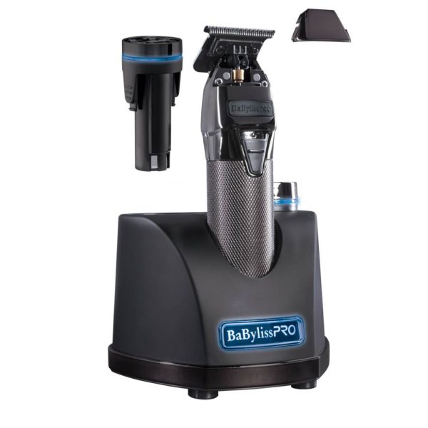 Maquina Snap trimmer Babyliss Pro El color predominante es gris metálico oscuro, presente en la base y el cuerpo principal del dispositivo. El recortador tiene detalles en negro brillante en la parte superior y en el cabezal de corte, así como una zona central con textura de gris plateado H2o Akuabateria de iones de litio H2o Akua