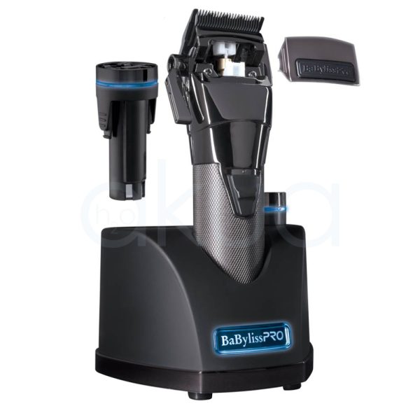 Maquina Snap Clipper Babyliss Pro El color predominante es gris metálico oscuro, presente en la base y el cuerpo principal del dispositivo. El recortador tiene detalles en negro brillante en la parte superior y en el cabezal de corte, así como una zona central con textura de gris plateado H2o Akua