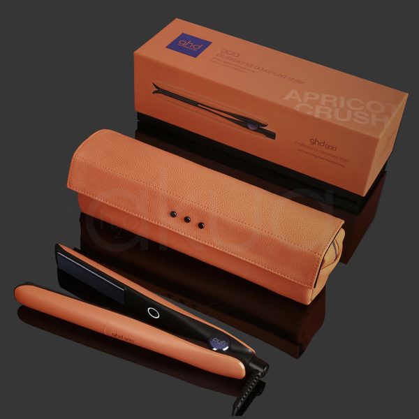 Plancha ghd Gold Naranja color principal del cuerpo y neceser en naranja con placas en color negro y detalle en azul en el lateral H2o Akua