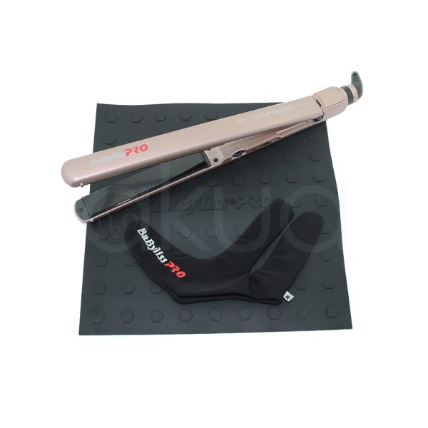 Plancha Sleek Expert Babyliss Pro BAB2072EPE El color predominante es rosa dorado mate (rose gold), que cubre todo el cuerpo y el mango de la plancha. Las placas alisadoras son de color negro brillante. El logotipo "BaByliss PRO" aparece en blanco y rojo sobre el fondo rosa dorado H2o Akua