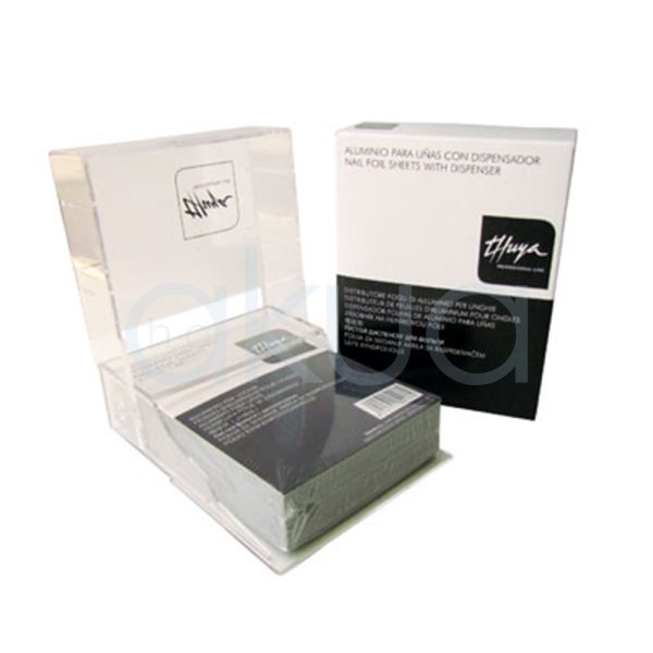 Aluminio Thuya para uñas 400 unid El color predominante es el blanco, presente tanto en el dispensador acrílico transparente como en la caja del producto. La caja tiene una franja negra en la parte inferior y el logotipo, así como el texto principal, están impresos en negro. El dispensador es completamente transparente, lo que permite ver el contenido interior y el paquete de hojas de aluminio en el interior del dispensador muestra un tono gris metálico, característico del aluminio H2o Akua