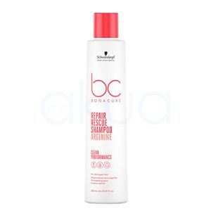 Champu Bonacure Repair rescue 250ml El envase del producto es blanco mate, tanto en el cuerpo de la botella como en la tapa. Los textos principales, incluyendo el logotipo “bc Bonacure” y la información clave del producto, están impresos en un rojo intenso que resalta sobre el fondo blanco. El logotipo de la marca Schwarzkopf Professional, ubicado en la parte superior, es de color negro. H2o Akua