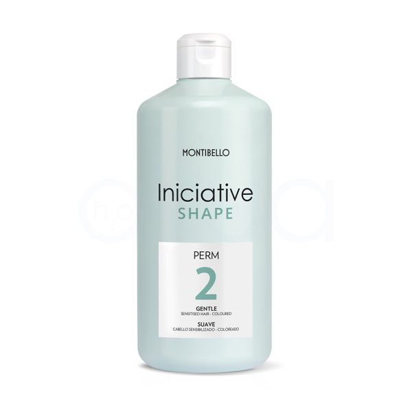 Locion Montibello permanente 2 suave 500ml El envase es predominantemente blanco, con una etiqueta rectangular de color verde claro en la parte frontal. El nombre de la marca y el producto están escritos en letras negras y verdes, y el tapón también es de color blanco. H2o Akua