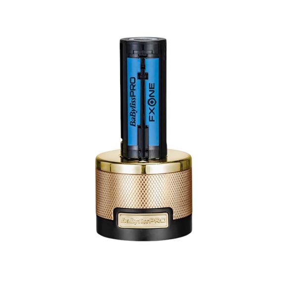 Recortadora FXONE Metal Gold Skeleton Babyliss pro El color más predominante es el dorado metalico, presente en la carcasa de la afeitadora, la base de carga y detalles del conjunto, lo que le da un aspecto lujoso y elegante. Negro: Aparece en la parte inferior de la base de carga y en algunos detalles del diseño. Azul: El cilindro de la batería muestra un color azul con inscripciones en negro. H2o Akua