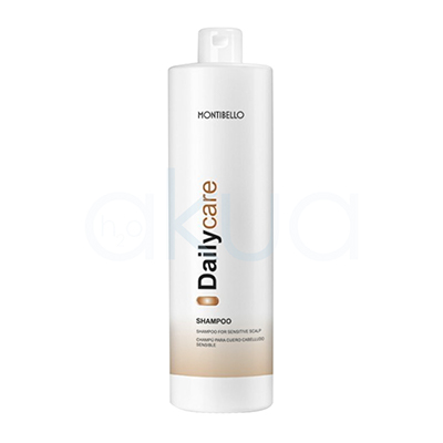 Champu cabello sensible Daily Care Montibello 1000ml. Envase cilíndrico blanco y el diseño presenta el nombre “Daily Care” en negro y dorado en vertical, con una banda dorada en la parte inferior. H2o Akua