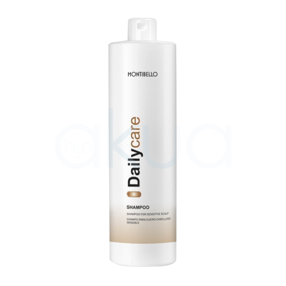 Champu cabello sensible Daily Care Montibello 1000ml. Envase cilíndrico blanco y el diseño presenta el nombre “Daily Care” en negro y dorado en vertical, con una banda dorada en la parte inferior. H2o Akua