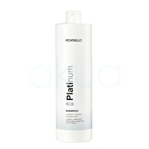 Champu cabellos blancos Platinum Montibello 1000ml Envase cilíndrico, alto y vertical, de color blanco brillante, con tapa tipo flip-top en la parte superior. El diseño es minimalista y moderno, con el nombre "Platinum" impreso en vertical en tonos grises y negros, y detalles adicionales de texto en negro en la parte inferior de la etiqueta. H2o Akua