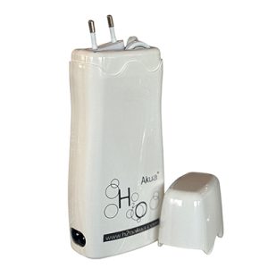 Fundidor con termostato H2oAkua. Dispositivo de color blanco brillante, con detalles en negro en el logo y la base. Tanto el aparato como la tapa adicional mantienen este tono blanco uniforme,