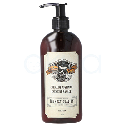 Crema de afeitado Captain Cook 250ml. Envase de crema para afeitado, de color ámbar con un dosificador negro y etiqueta vintage de estilo barbería en tonos beige y azul. H2o Akua