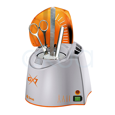 Esterilizador de cuarzo GX7 ceriotti. Equipo compacto, de diseño moderno en blanco y naranja, destinado a la desinfección rápida de herramientas metálicas de peluquería y estética como tijeras, alicates, pinzas y empuja cutículas. H2o Akua