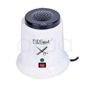 Esterilizador de cuarzo Eurostil. Aparato de color blanco con tapa superior negra. En la parte inferior frontal se encuentran un interruptor de encendido/apagado (color rojo) y una luz piloto indicadora (color verde). El diseño es compacto y funcional, con base ancha y estable. H2o Akua