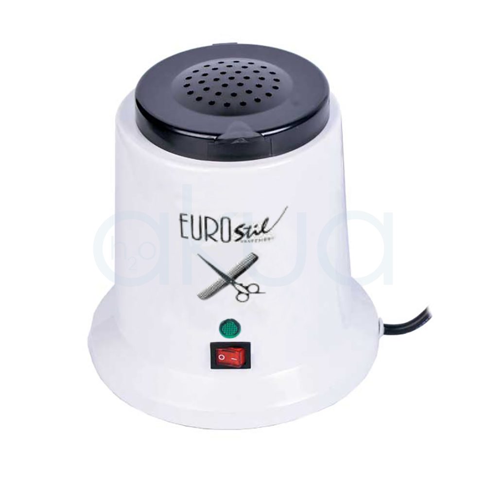 Esterilizador de cuarzo Eurostil. Aparato de color blanco con tapa superior negra. En la parte inferior frontal se encuentran un interruptor de encendido/apagado (color rojo) y una luz piloto indicadora (color verde). El diseño es compacto y funcional, con base ancha y estable. H2o Akua