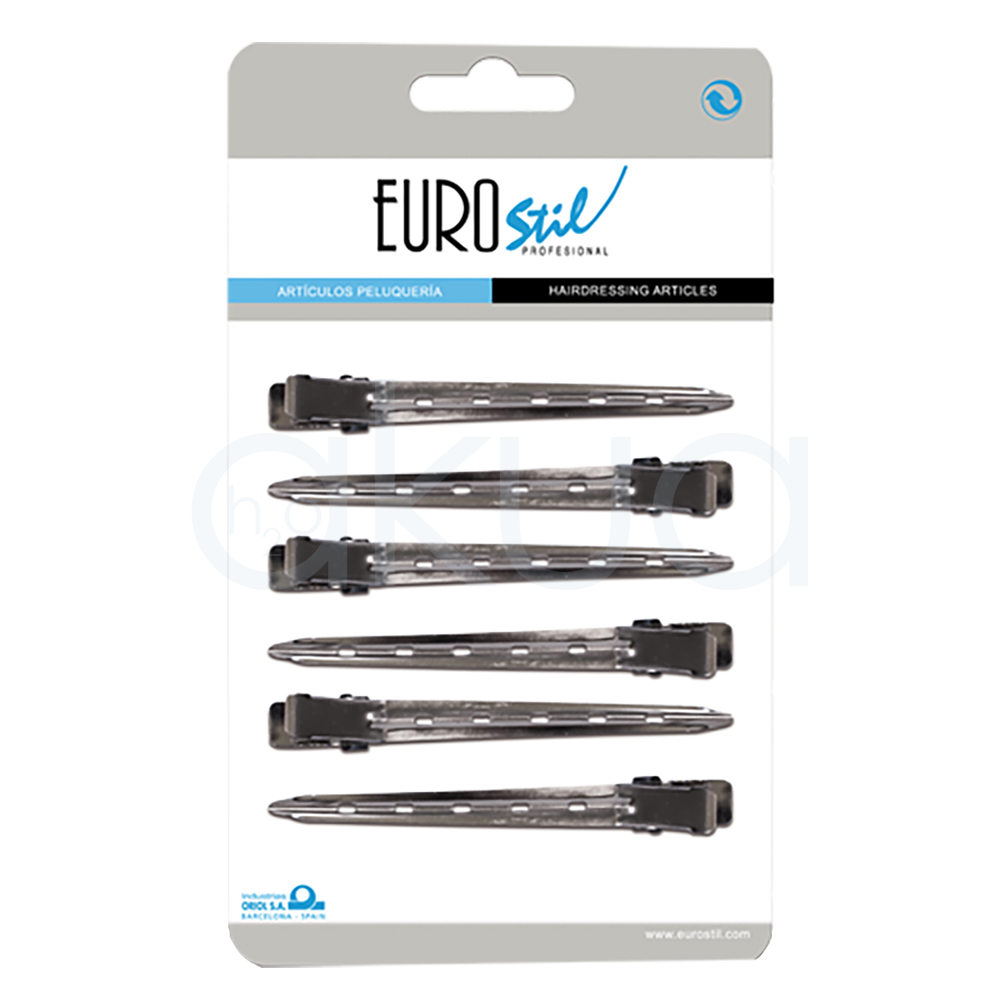 Pinza toga Stil metal 6 unidades. Set de seis pinzas de pelo metálicas tipo "toga", dispuestas en paralelo sobre un fondo blanco. Estas pinzas, fabricadas en metal plateado, presentan pequeñas perforaciones a lo largo del cuerpo para mejorar el agarre y un mecanismo de pinza sencillo tipo muelle. H2o Akua