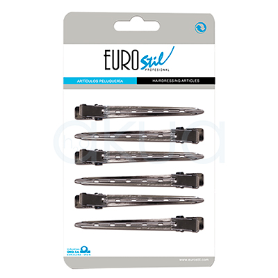 Pinza toga Stil metal 6 unidades. Set de seis pinzas de pelo metálicas tipo "toga", dispuestas en paralelo sobre un fondo blanco. Estas pinzas, fabricadas en metal plateado, presentan pequeñas perforaciones a lo largo del cuerpo para mejorar el agarre y un mecanismo de pinza sencillo tipo muelle. H2o Akua