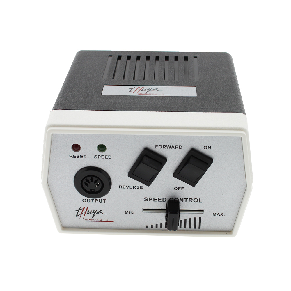 Torno profesional Thuya. Torno eléctrico profesional de manicura/pedicura, compuesto por una caja de control rectangular de color plateado con detalles en negro, dos interruptores inclinados y dos luces indicadoras (una roja y una verde). H2o Akua