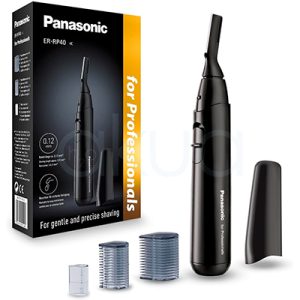Recortadora Panasonic ER-RP40 de pelo facial. La imagen muestra una recortadora eléctrica de precisión Panasonic de color negro, junto a su caja de presentación donde se lee la marca y el modelo, así como la indicación “for Professionals”. Además del aparato principal, se ven un capuchón protector y varios peines o cabezales accesorios transparentes y grisáceos, diseñados para ajustar la longitud de corte en zonas como cejas, vello facial o contornos. H2o Akua