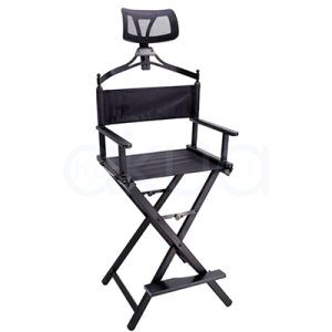 Respaldo silla maquillador Nueva 06157. La imagen del respaldo de la silla del maquillador muestra la parte posterior de un asiento ergonómico profesional con cabecero alto de malla transpirable negra ventilada para comodidad prolongada. El respaldo central es acolchado negro, montado sobre columna metálica gris ajustable en altura, diseño pensado para clientes en servicios de peluquería o maquillaje.