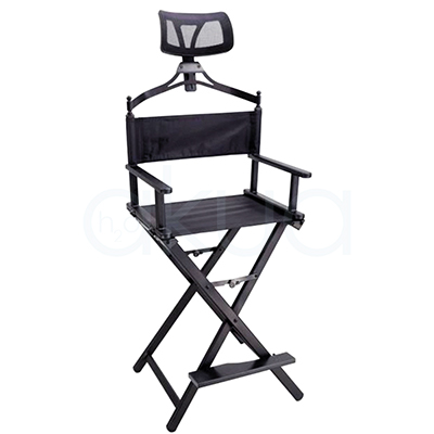 Respaldo silla maquillador Nueva 06157. La imagen del respaldo de la silla del maquillador muestra la parte posterior de un asiento ergonómico profesional con cabecero alto de malla transpirable negra ventilada para comodidad prolongada. El respaldo central es acolchado negro, montado sobre columna metálica gris ajustable en altura, diseño pensado para clientes en servicios de peluquería o maquillaje.