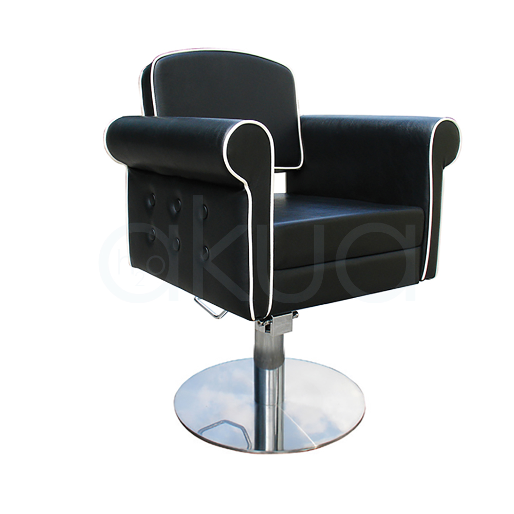Sillon pie redondo Style negra 06095/50/2. Modelo de peluquería o barbería en estilo vintage o retro capitoné, con tapizado negro en polipiel y ribetes blancos contrastantes. H2o Akua