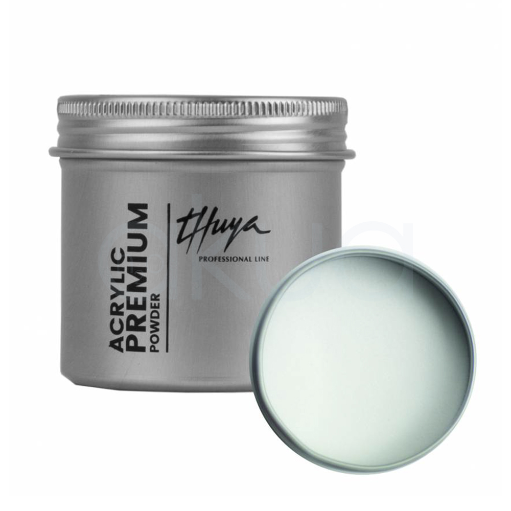 Acrylic Premium Powder Blanco Thuya.. Tarro de polvo acrílico Premium, en envase metálico plateado. A la izquierda, el tarro cerrado con etiquetas verticales "Thuya" en negro elegante y "Acrylic Premium Powder" en inglés/español; tapa abierta a la derecha revela polvo blanco translúcido (clear/cover powder para uñas acrílicas). H2o Akua