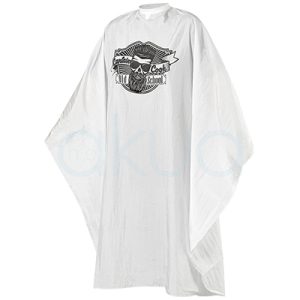 Capa corte blanca Captain cook 04975/58. Es una capa de barbería de color blanco, con estampación frontal en blanco del logo “Captain Cook” de estilo old school con calavera y barba en el pecho. H2o Akua