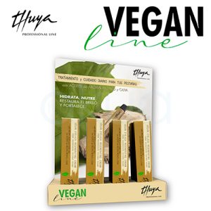 Expositor crema regeneradora vegan 8 unid Thuya. Se presenta en ocho tubos beige/dorado (15 ml cada uno) alineados en soporte kraft blanco con base "VEGAN Line Thuya". Cartel vertical explica: "Tratamiento y cuidado diario para pestañas con aceite de argán. Hidrata, nutre, restaura el brillo y fortalece". Iconos verdes. H2o Akua
