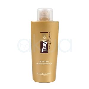 Champu nutritivo cacao Traybell 300ml Alcantara Outlet. El envase tiene forma cilíndrica con bordes redondeados y una base plana. En la parte superior cuenta con un dispensador tipo bomba (pump), lo que facilita su uso. De color dorado/bronce con acabado mate, mientras que el dispensador es blanco. La etiqueta frontal combina tonos oscuros (marrón/negro) con detalles claros. H2o Akua