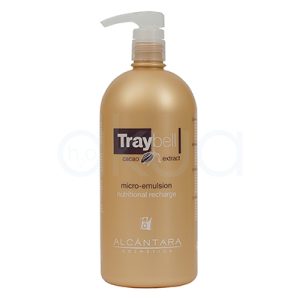 Micro emulsion cacao traybell 1000ml Alcantara. La imagen muestra un producto capilar de la marca Traybell, de Alcántara Cosmética, en formato bote de 1000 ml con envase ovalado color dorado y tapa translúcida en la base. En la etiqueta se lee “micro-emulsion nutritional recharge”, “cacao extract” y “Traybell”, lo que indica que es un tratamiento nutritivo para el cabello con extracto de cacao. H2o Akua
