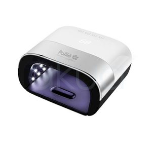 Lampara de uñas UV/LED. Lámpara profesional UV/LED para uñas de diseño compacto y moderno en color blanco con base negra. El dispositivo tiene forma rectangular con bordes redondeados y una abertura frontal amplia para introducir cómodamente la mano durante el secado de esmaltes y geles semipermanentes. En el interior se observan luces LED encendidas para el curado rápido y uniforme. En la parte superior incorpora botones de control y pantalla digital para ajustar el tiempo de uso. El producto está orientado a manicura profesional y estética de uñas. H2o Akua