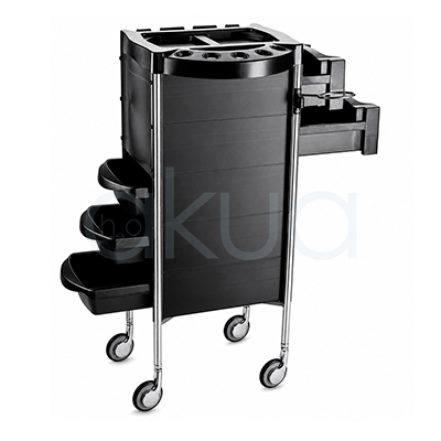 Carrito peluqueria modelo Smile H2oAkua. Carro auxiliar profesional de peluquería en color negro con estructura compacta y diseño funcional. Dispone de varios cajones laterales extraíbles, bandejas organizadoras, compartimentos superiores para herramientas y soportes específicos para cepillos, peines, secadores y accesorios. Cuenta con cuatro ruedas giratorias para facilitar el desplazamiento dentro del salón.