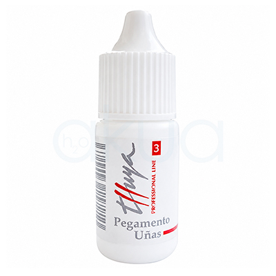 Pegamento de uñas Thuya 3gr. Frasco blanco de pegamento para uñas Thuya Professional Line de 3 g, con diseño cilíndrico y tapón alargado blanco. La etiqueta muestra el logotipo de Thuya en negro y rojo, el número 3 en un recuadro rojo y la inscripción "Pegamento Uñas / Nail Glue". H2o Akua